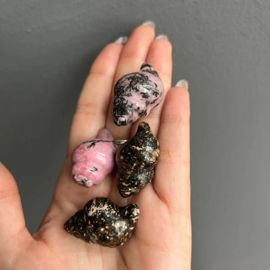 Pink black speckled seashell ring with gold accents for tranquility