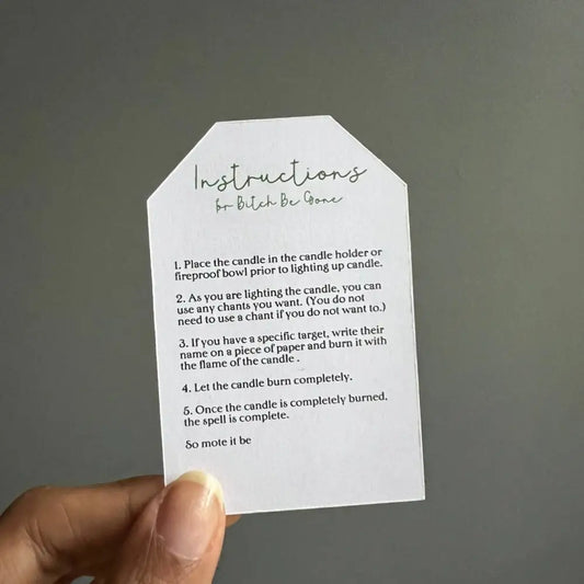 White tag with black text for Bitch be Gone Ritual Candle spell