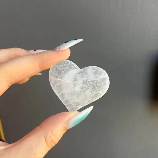 Heart-shaped clear quartz pendant necklace carved from Moroccan gypsum selenite