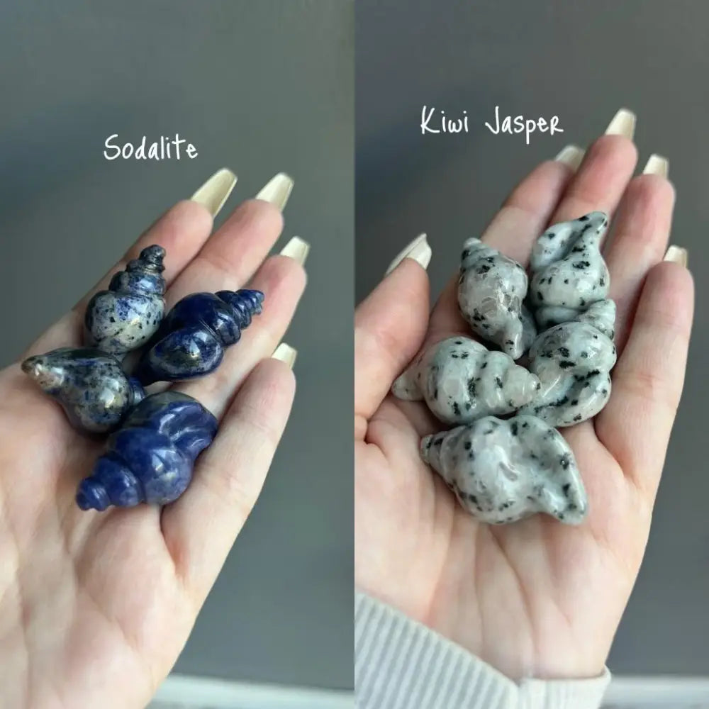 Set of three sodalite snail figurines in blue white speckled stone from Natural Crystal Shells Ocean Collection