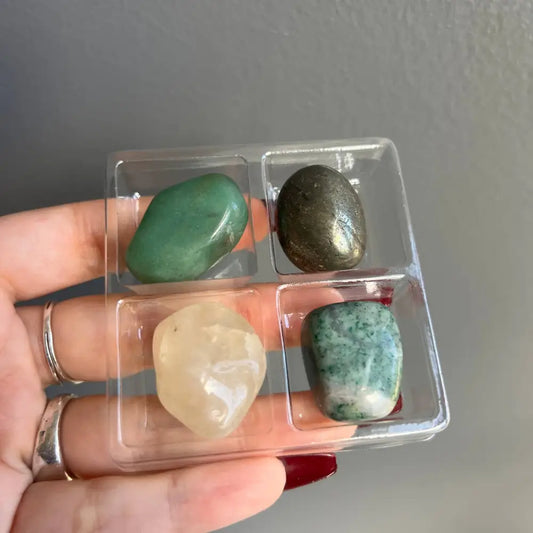 Clear plastic tray with compartments for green aventurine, rose quartz stones in Natural Stone Collection