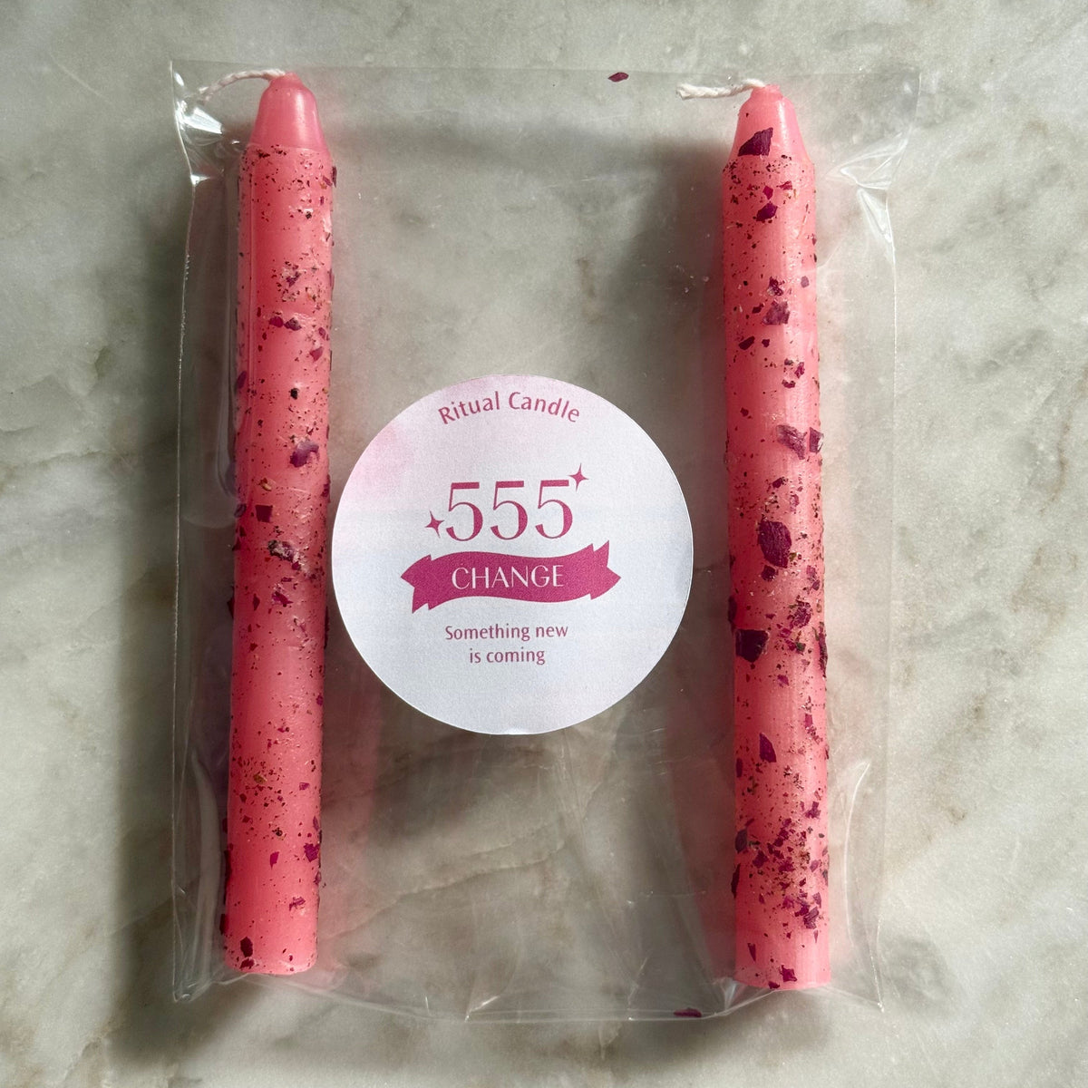 Pink 555 Change ritual candle pair with red flecks