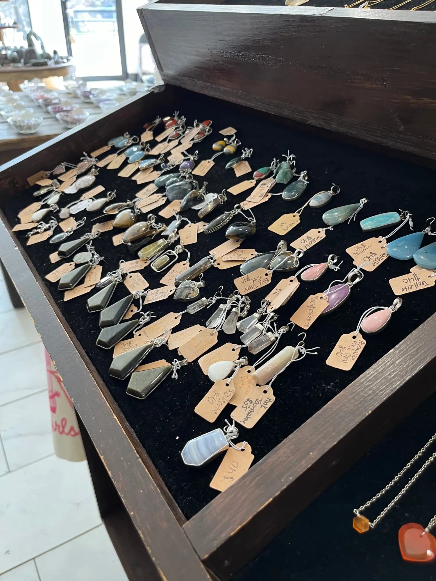 Silver and gold pendant necklace in black velvet case with Pietersite gems