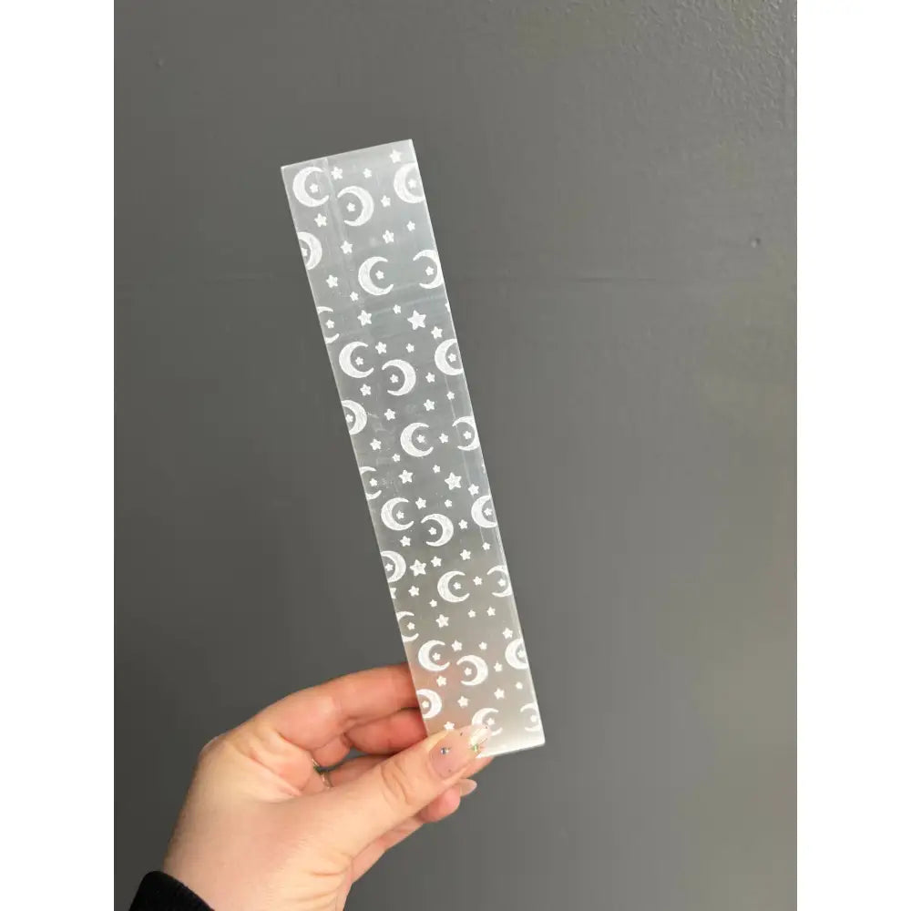 Silver moon and star bookmark on 8 inch selenite crystal charging bar