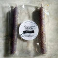 666 Reflect dusty purple ritual candle pair with herb inclusions
