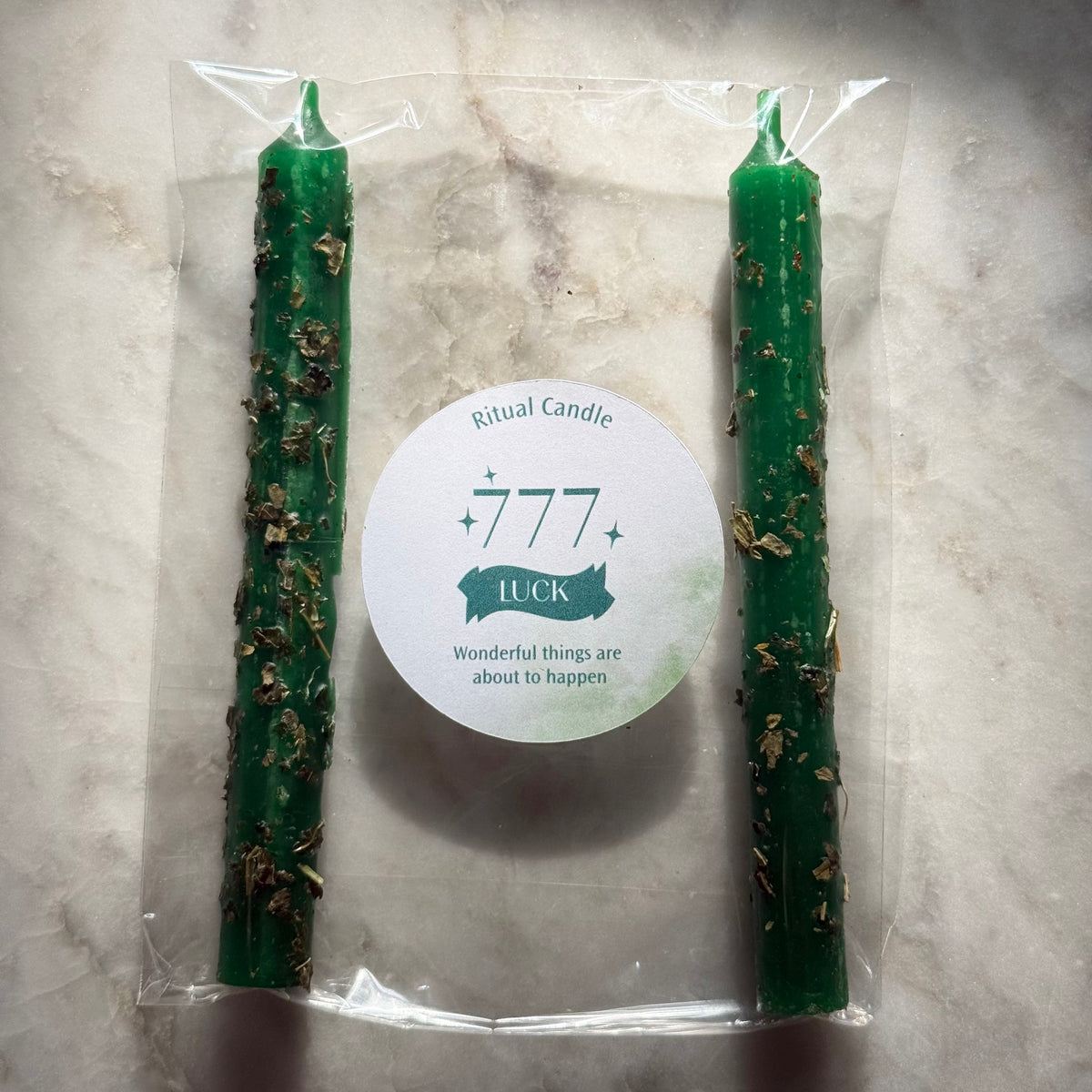 777 Luck green ritual candle pair with herb inclusions