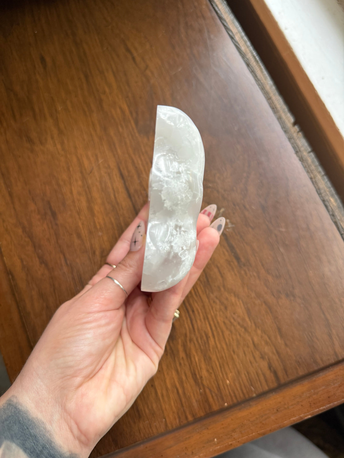 Selenite butterfly bowl side profile showing the wing-shaped curve