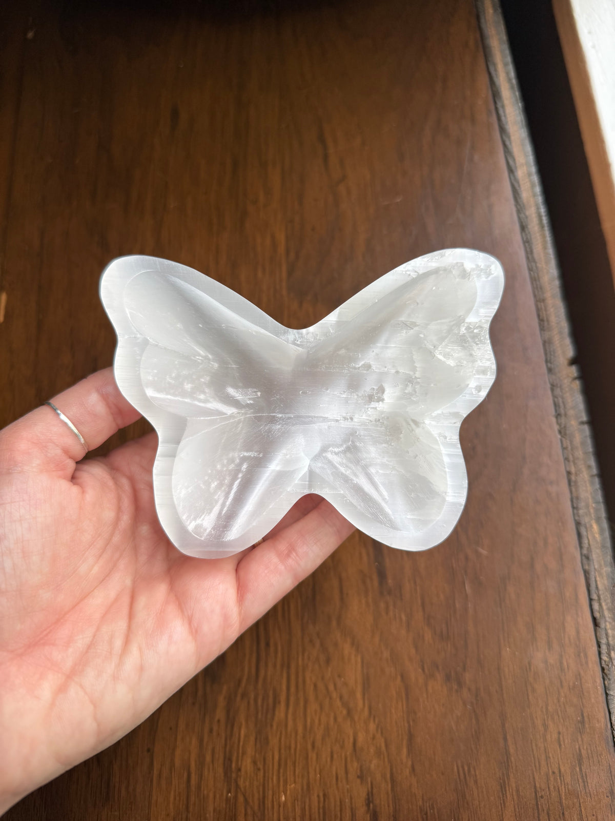 Selenite butterfly-shaped bowl top view showing the shallow basin