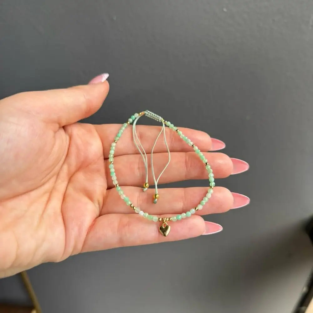 Handmade green beaded adjustable crystal gemstone bracelet with gold heart charm