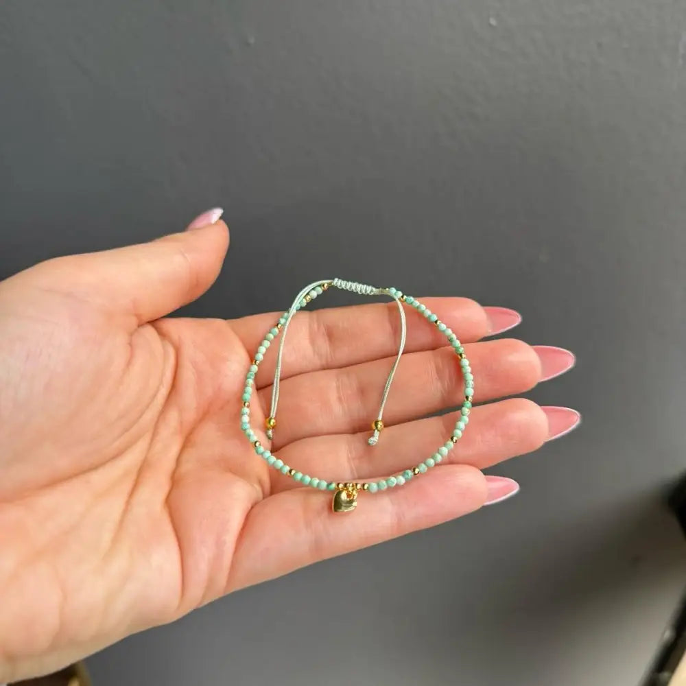 Mint green beaded adjustable crystal bracelet with gold heart charm