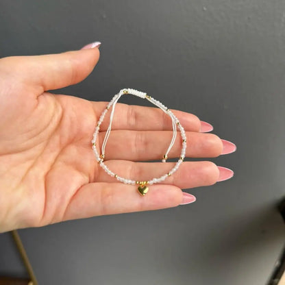 White adjustable crystal gemstone bracelet with gold heart charm