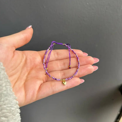Purple beaded crystal gemstone bracelet with gold heart charm