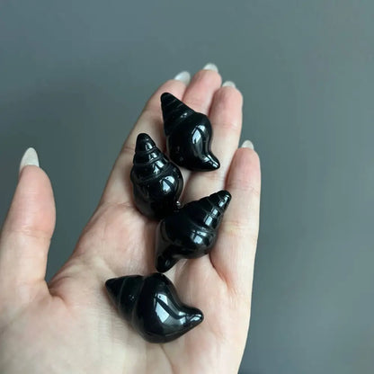1-inch black conch shell calming crystal carving for tranquility