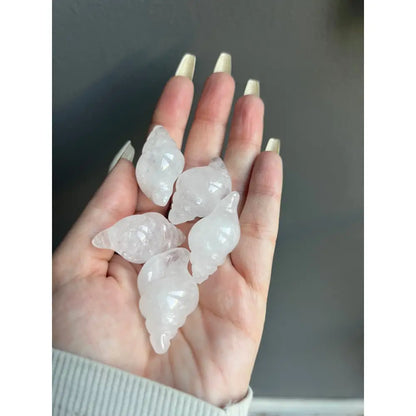 White seashell charm bracelet with 1 inch calming crystal carving for tranquility