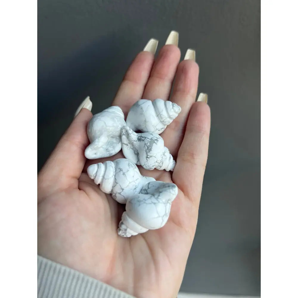 1-inch white seashell carving with gray speckles for tranquility