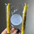 Aquarius ritual candles, two yellow herb dressed tapers