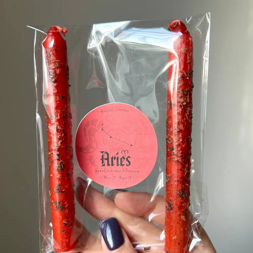 Aries ritual candles, two red herb dressed tapers