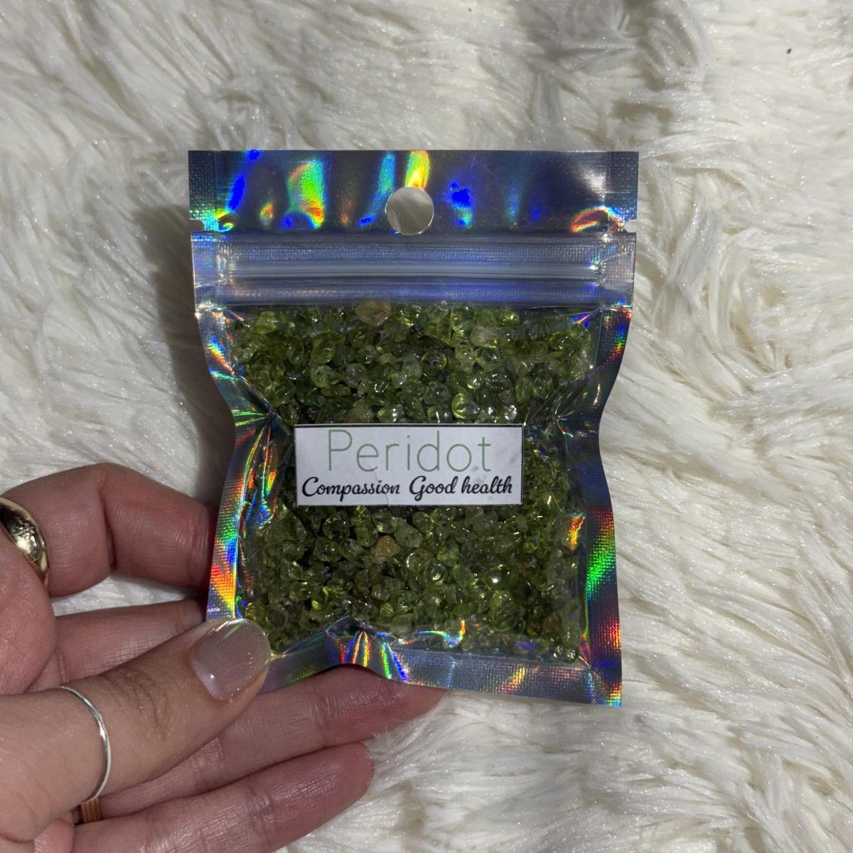 Peridot crystal chips in a holographic bag for crafts and decor