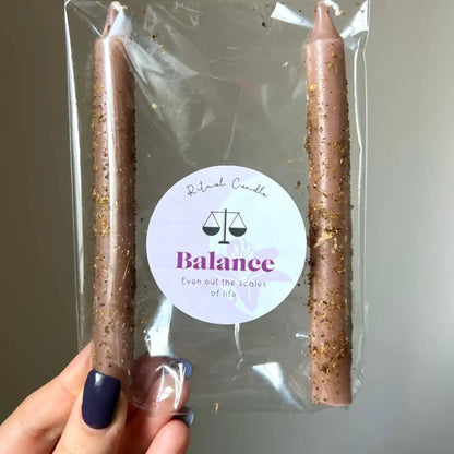 Rose gold glittery taper candles in Balance Ritual package for fairness