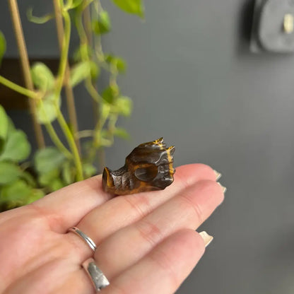 Golden skull pendant necklace with natural crystal stones for peace