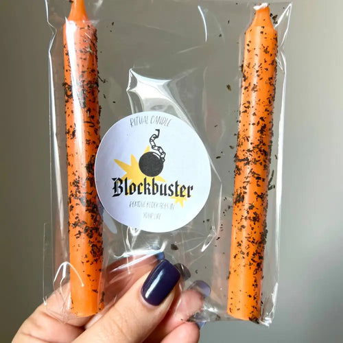 Blockbuster orange taper candle with black speckles for clearing obstacles