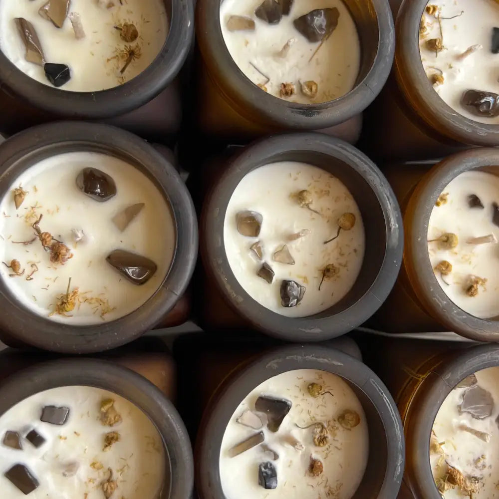 Matte amber glass Briar Crystal Jar soy candle with black wax and dried flowers