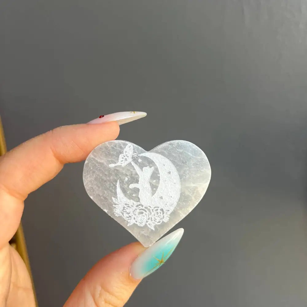 Heart-shaped selenite cat and flower pendant from Morocco