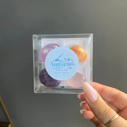 Aquarius tumbled gemstone set with purple orange pink stones in clear box