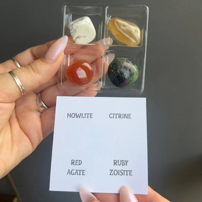 Zodiac tumbled crystal set in 4-compartment case with howlite, citrine, red agate, ruby zoisite