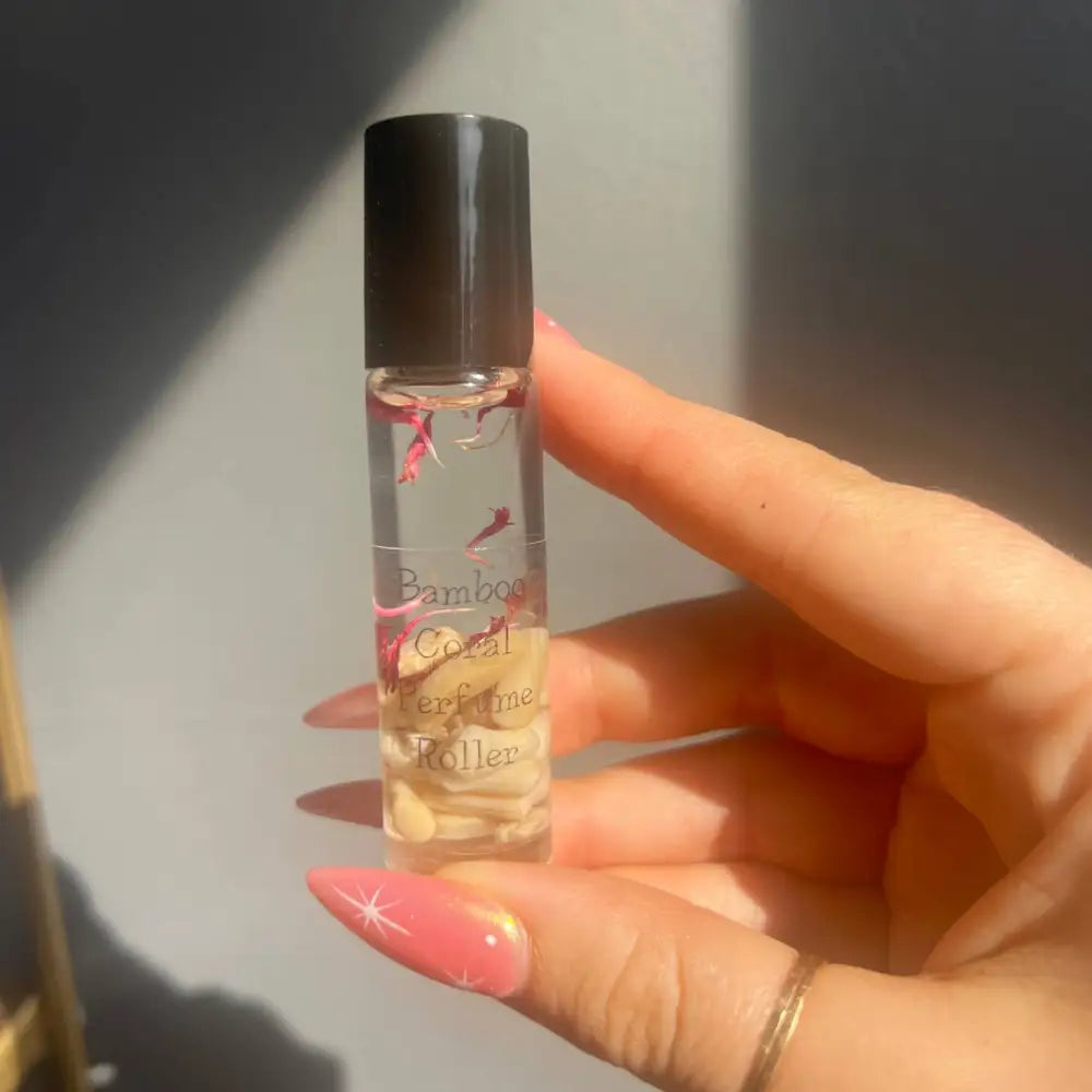 Cedar Wood and Pear perfume roller with bamboo coral design