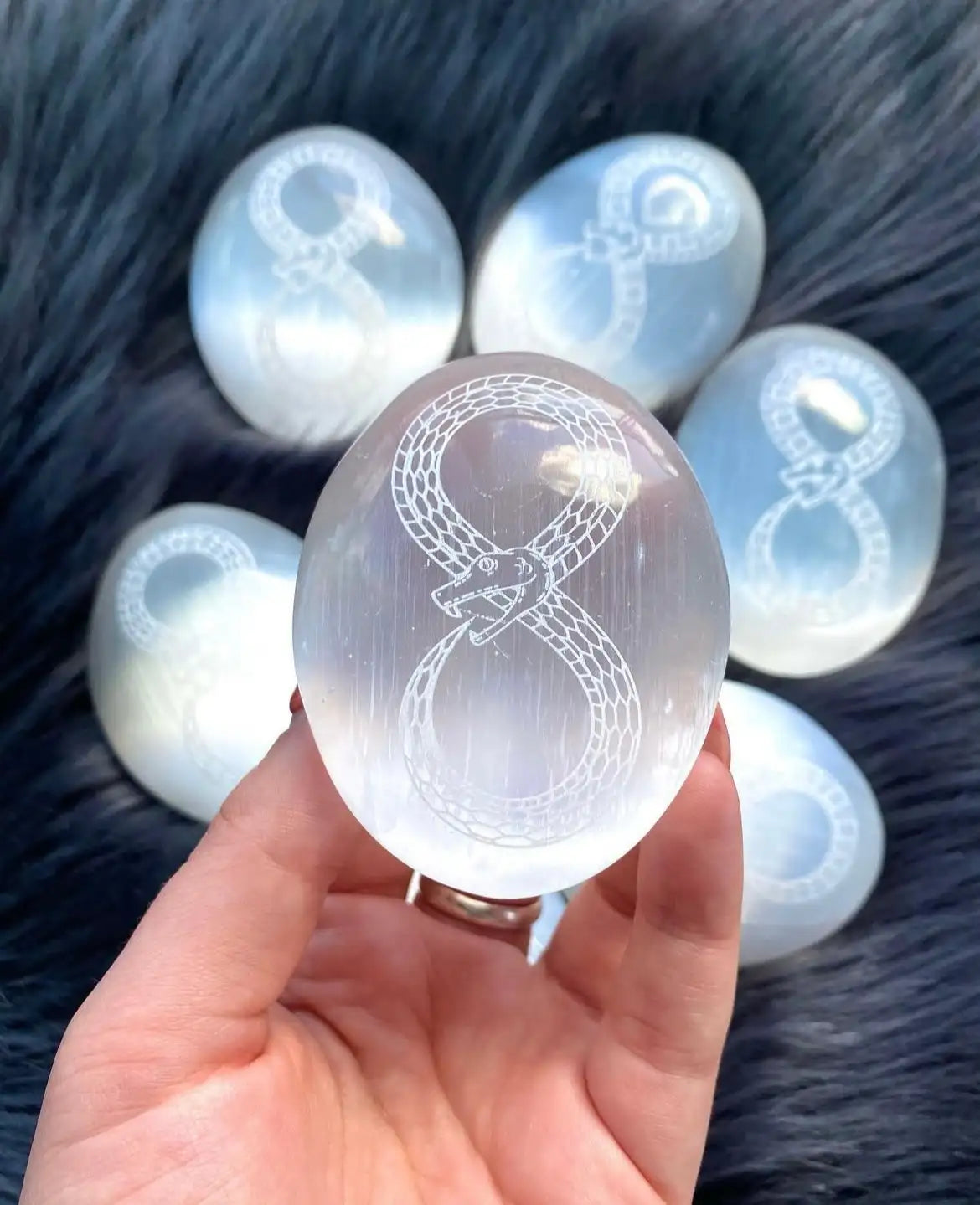 Clear crystal egg with etched snake design