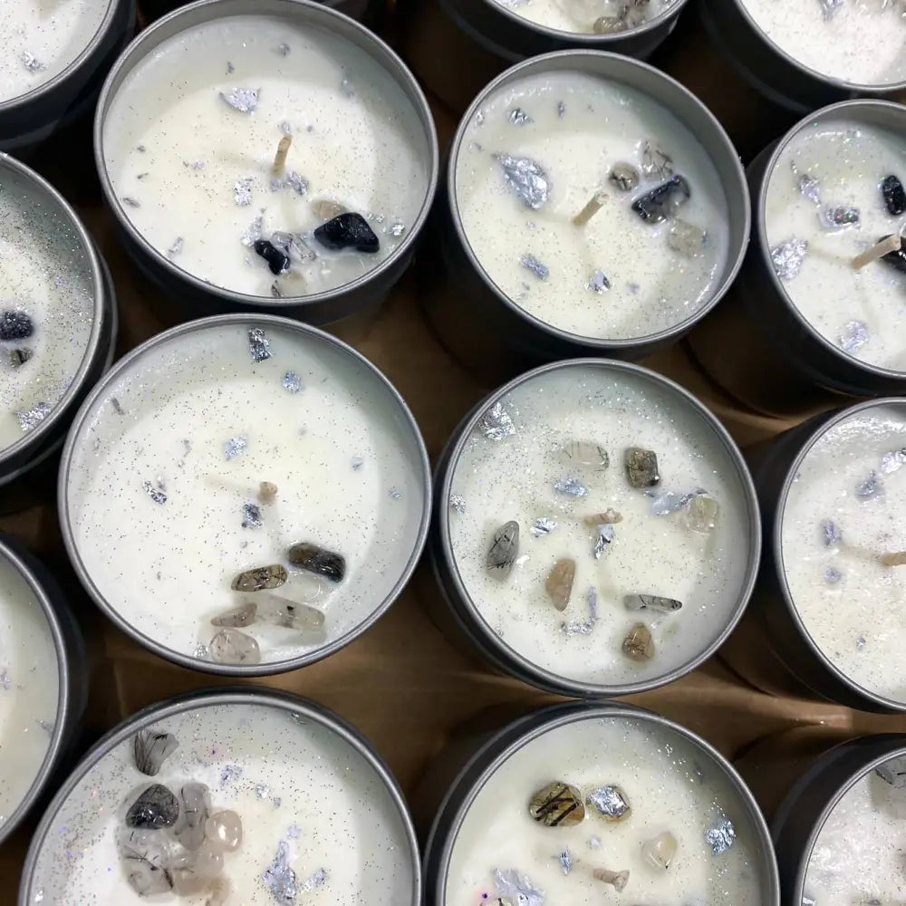 4oz crystal chip tin candle in white with black silver accents and calming scent