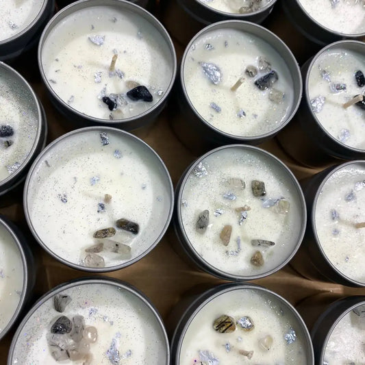 4oz crystal chip tin candle in white with black silver accents and calming scent