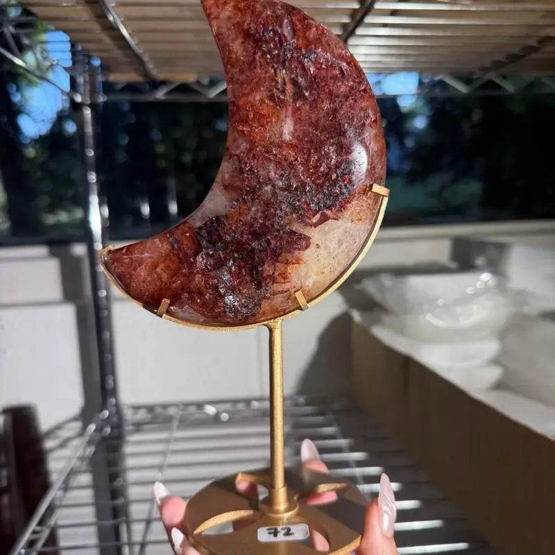 Crescent moon red agate on gold stand with 92, Fire Quartz figurine