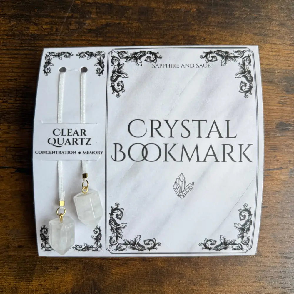 Clear quartz crystal bookmark with white cord and charm, 16 inch