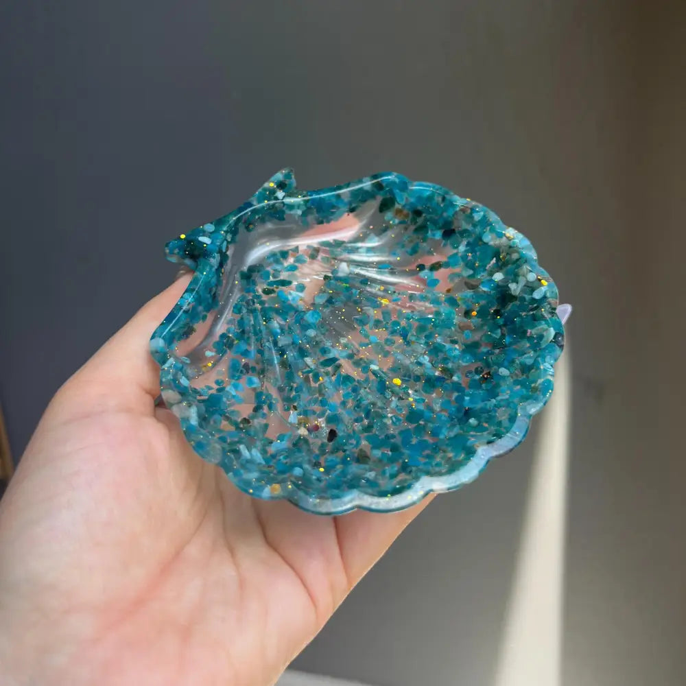 Blue resin seashell trinket dish with glitter and scalloped edge