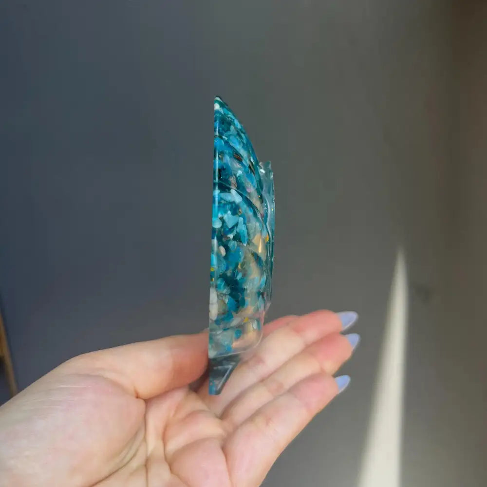 Blue green resin feather pendant in Crystal Seashell Resin Bowl