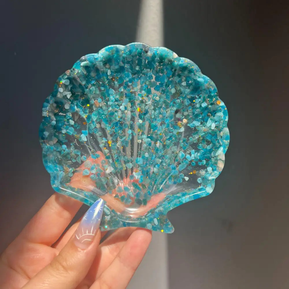 Blue seashell resin bowl with glitter, sand texture, and hand-placed crystals