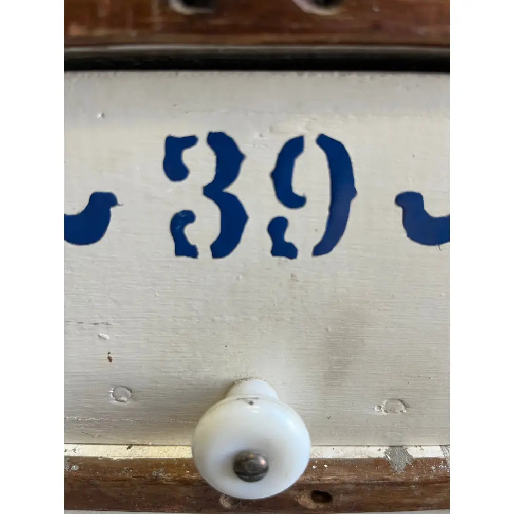 Vintage 39-numbered drawer pull with white ceramic knob and blue number from Mystery Crystal Box