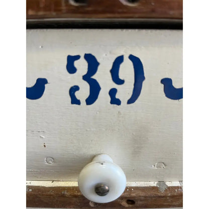Vintage 39-numbered drawer pull with white ceramic knob and blue number from Mystery Crystal Box