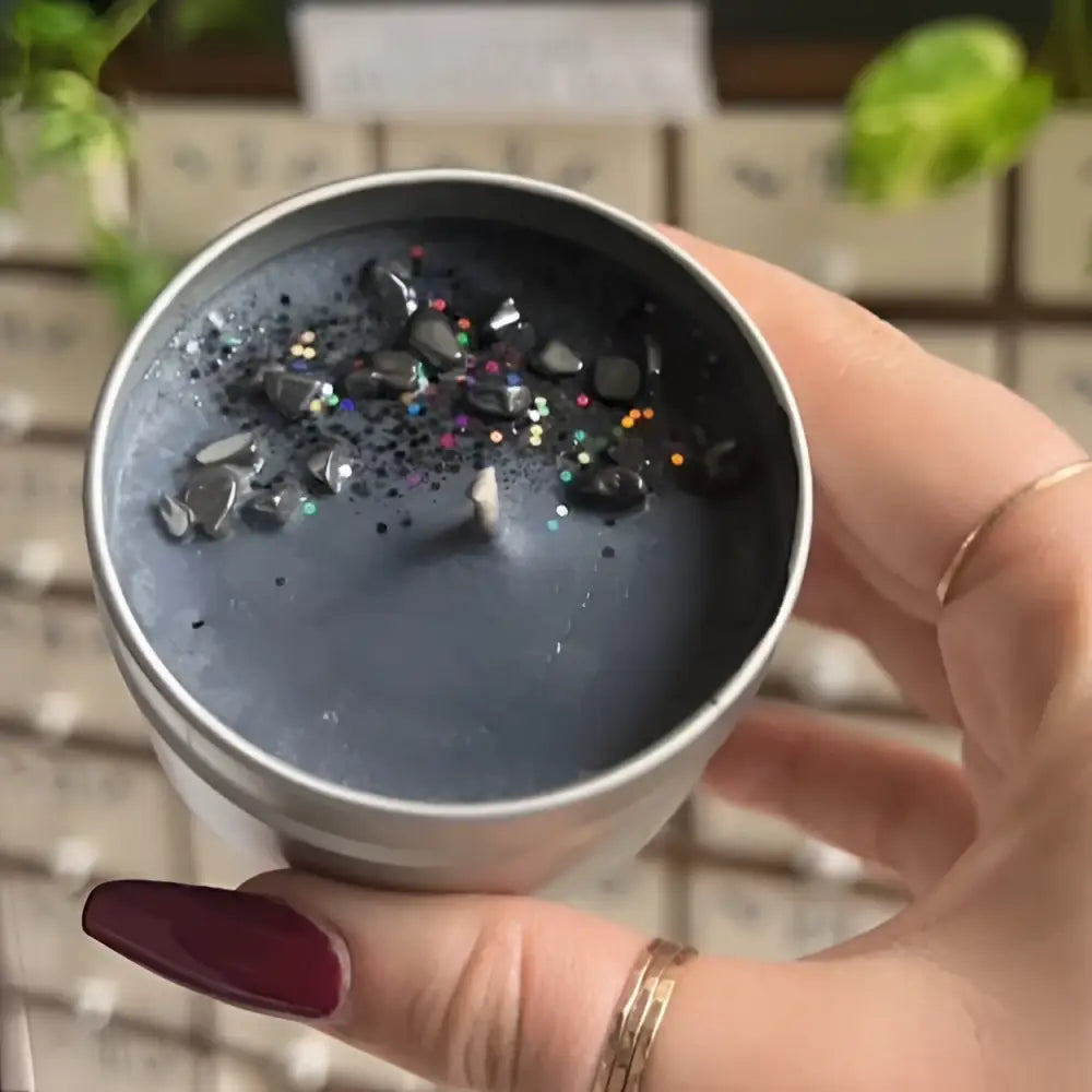 Silver metallic candle tin with iridescent glitter and black wax in Mystery Crystal Box from Apothecary Case