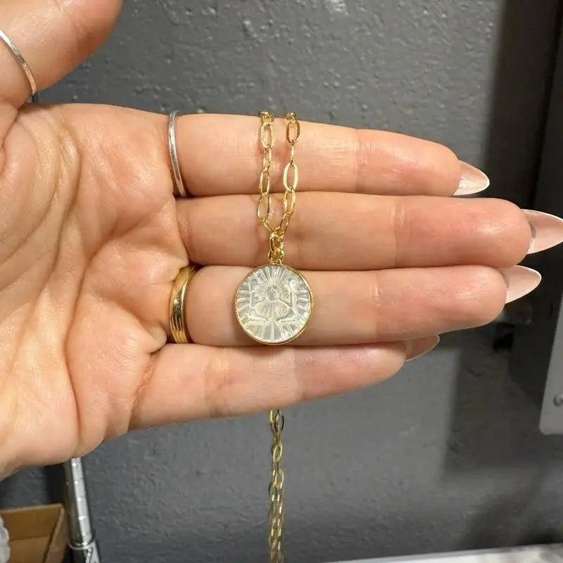 15mm Zodiac Pendant Necklace with gold chain and sunburst design