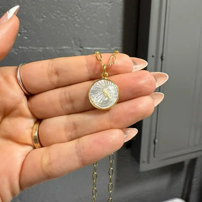 15mm gold zodiac pendant necklace with floral design and white stone