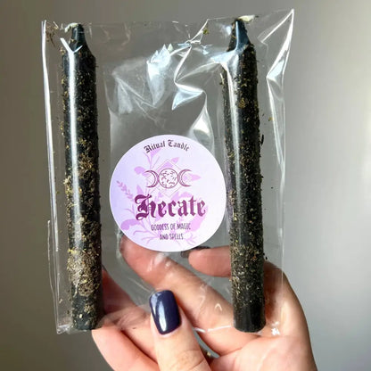 Black Hecate ritual candle with pentagram and glittery details in packaging