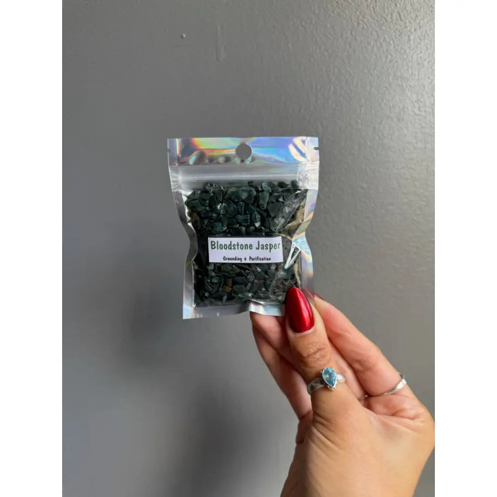 Black bloodstone jasper chip stones in clear bag for crafts