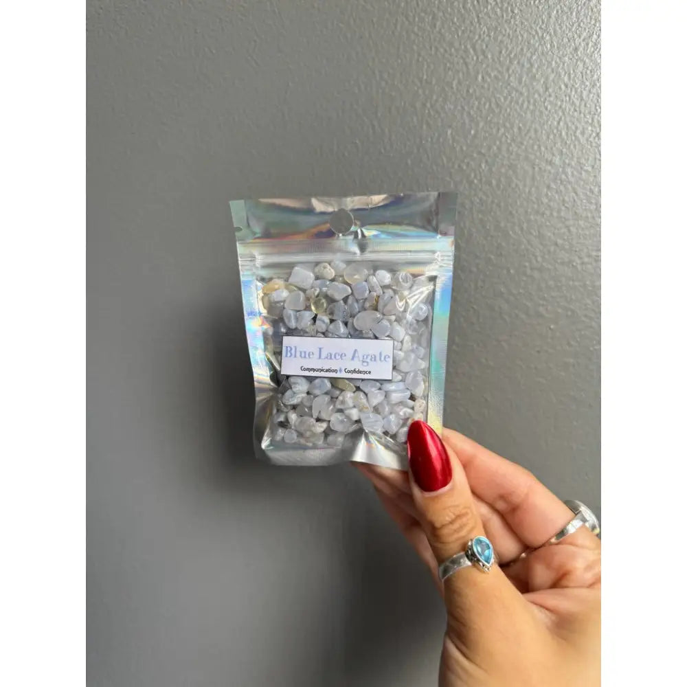 Premium crystal chip stones in clear bag with white gems and holographic accents
