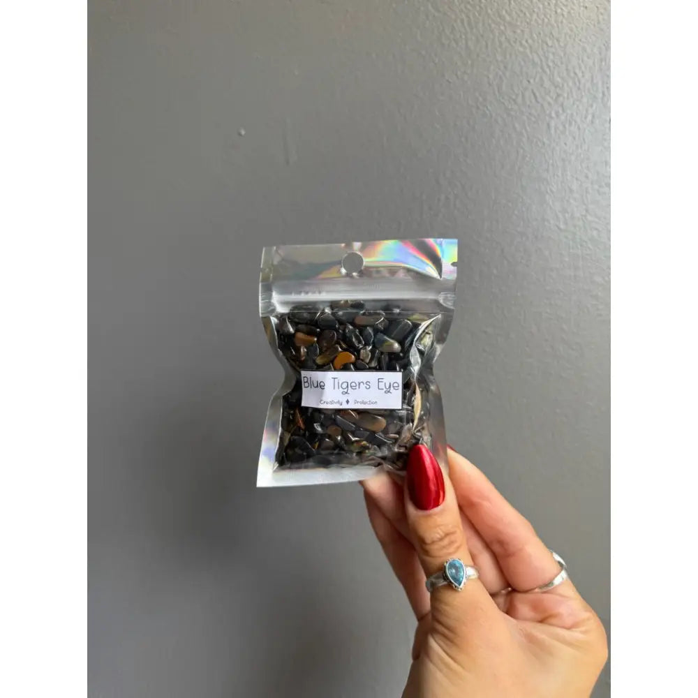 Blue Tigers Eye gemstone chip beads in bag for crafts
