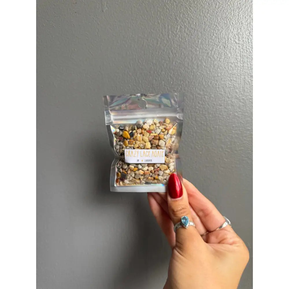 Clear plastic bag of colorful Premium Crystal Chip Stones with white label