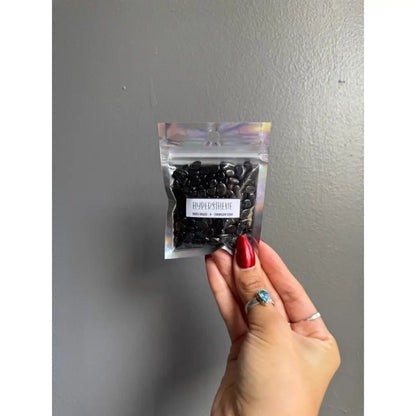 Black bean snack bag with clear window and silver text for premium crafts