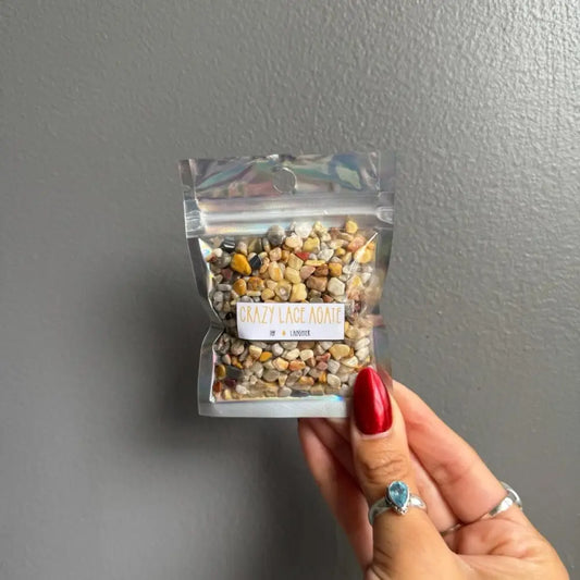 Premium holographic pebble mix in clear bag with gold label for crafts
